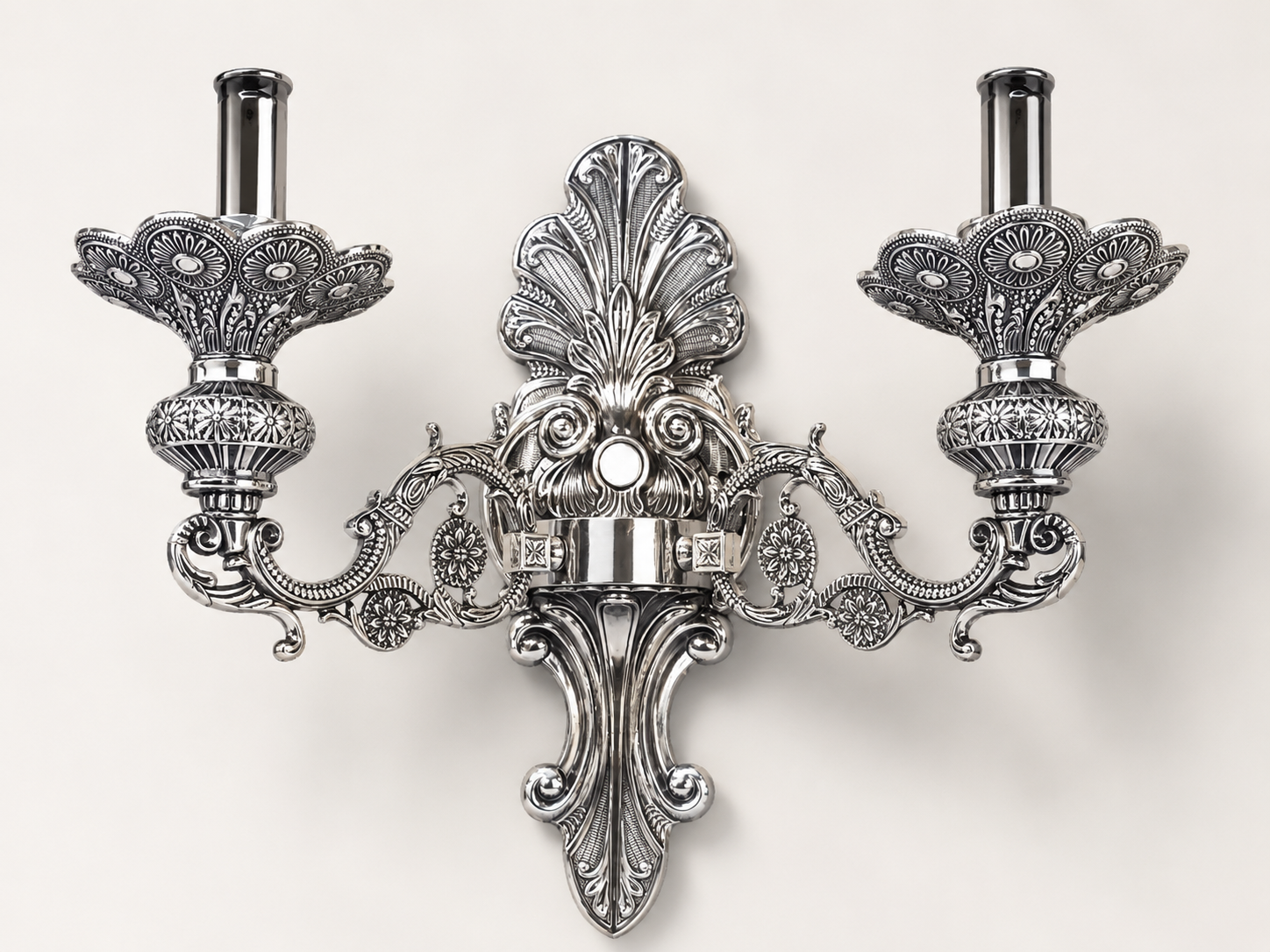 Silver decorative wall sconce after color change